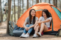 women-couple-camping-picnic-together-forest